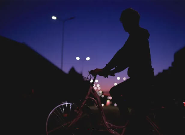 on bike at night